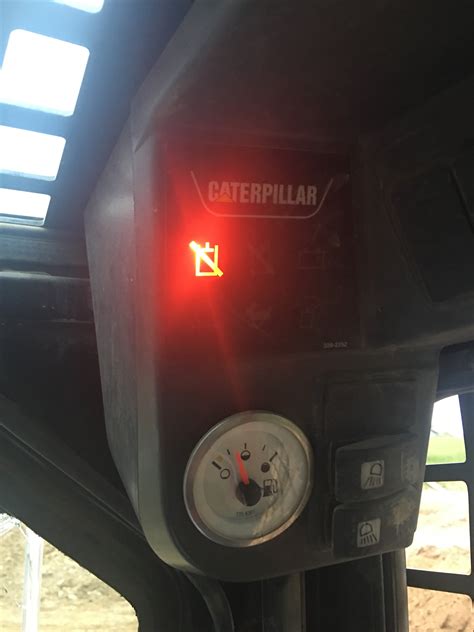 cat skid steer puff of air warning light|caterpillar skid steer troubleshooting lights.